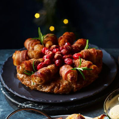 Extra Special Brown Butter & Spiced Dark Rum Stuffing Wreath with Brûléed Pigs in Blankets, £8/serves 10